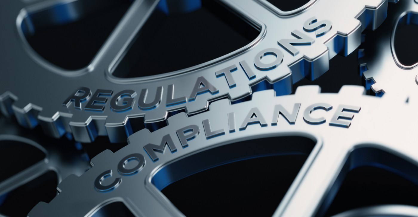 Image of two gears working together, one is named compliance and the other is regulations