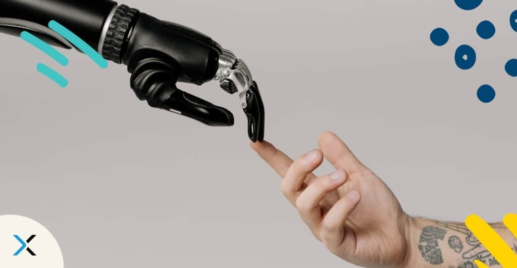 A robot hand touching a human hand symbolizes human ai collaboration.